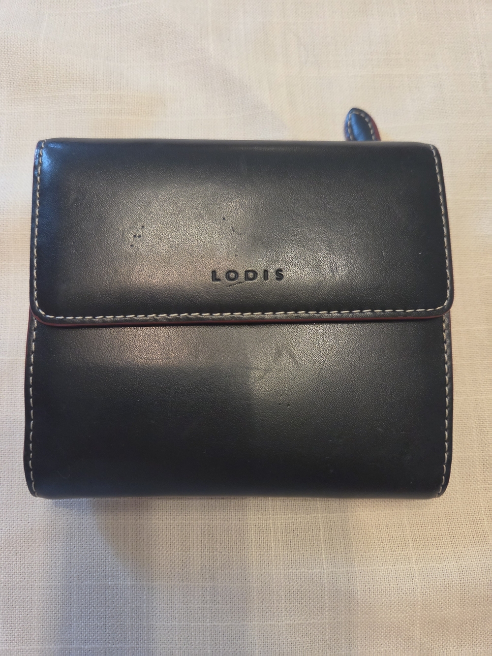 Lodis Black Leather Bi-Fold Wallet with Red Trim